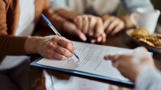 Signing a paper